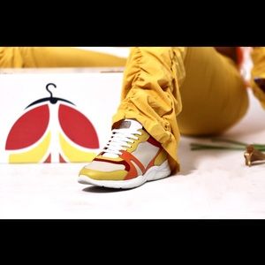 Petals are Italian leather and sued designer shoes specially crafted in Italy